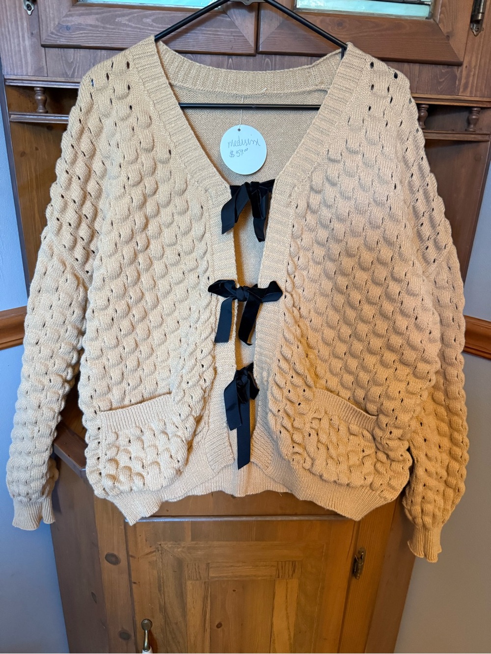 Bella’s boutique tan bubble-knit bow oversized  cardigan L